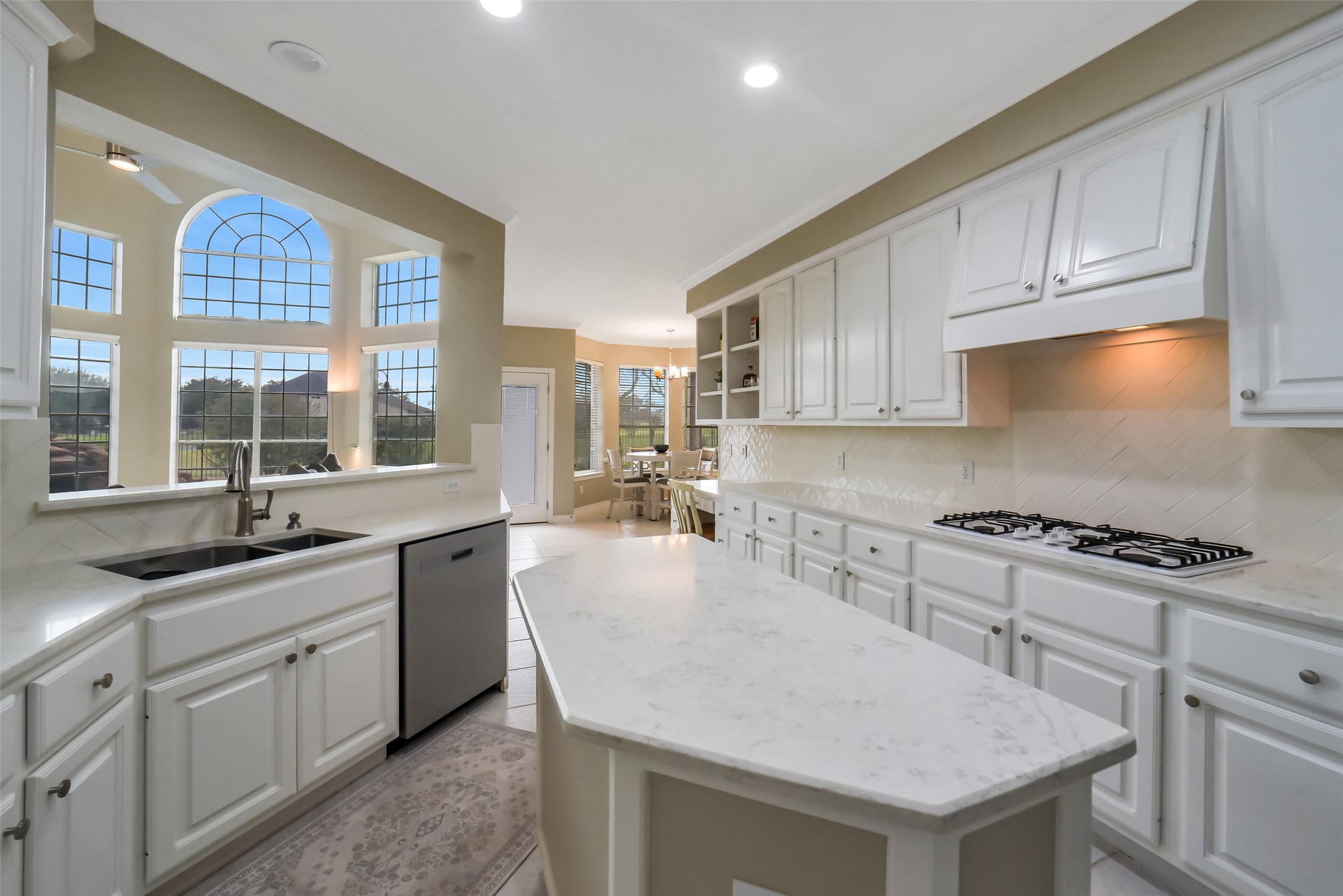 24403 Falcon Point Drive Katy, TX 77494 - Photo 11 of 32 Another view of the gourmet kitchen, note the large stainless steel sink.