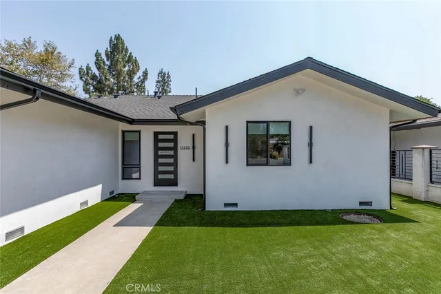 a front view of house with yard