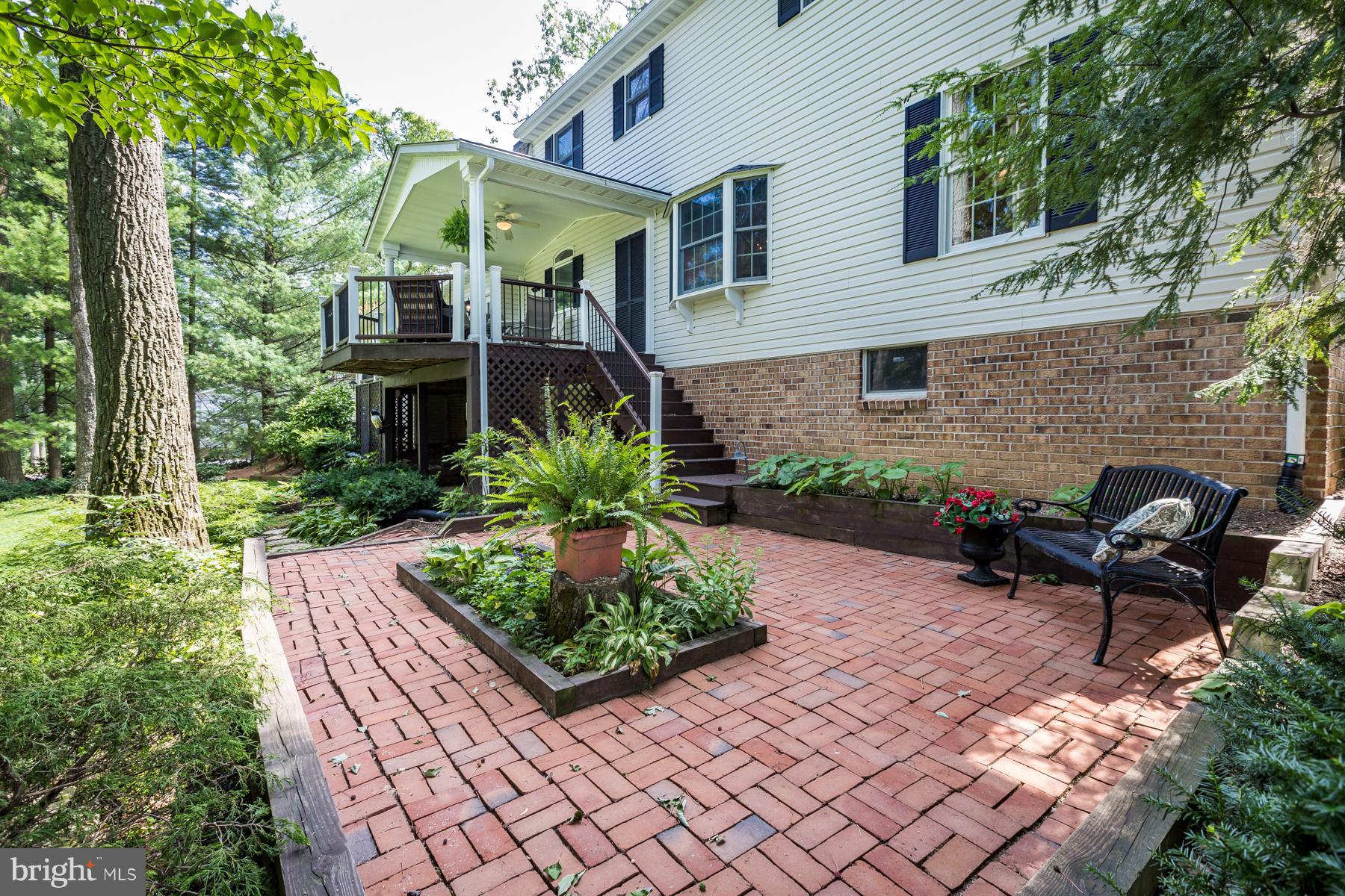 2566 Coon Club Road Hampstead, MD 21074 - Photo 25 of 30 Brick Patio Adjoining Covered Deck/Porch