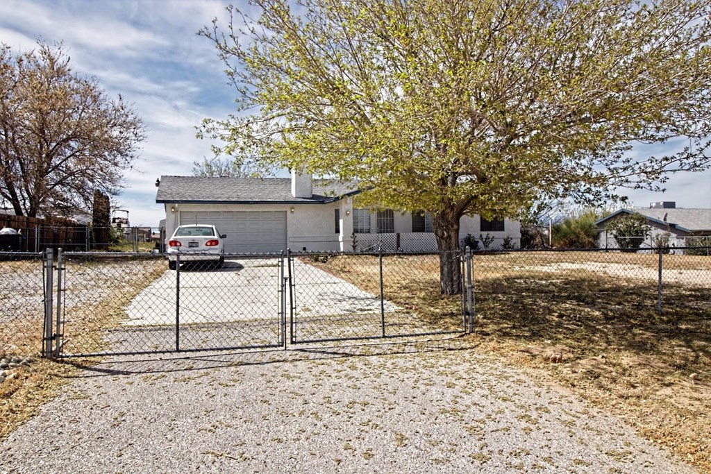 14965 Ritter Street Victorville, CA 92394 - Photo 1 of 1 a view of street with a yard