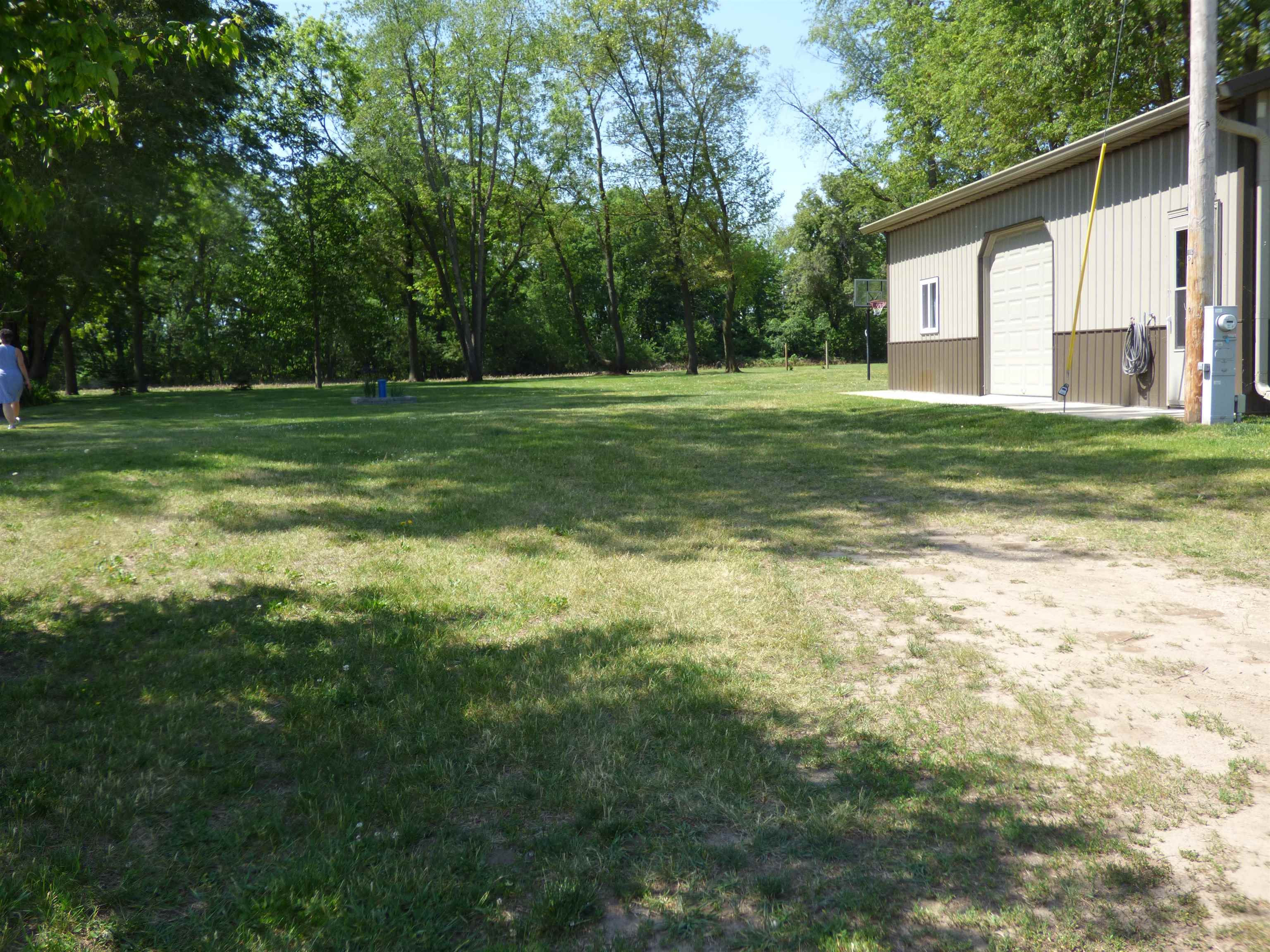 6384 A Diehl Road Savanna, IL 61074 - Photo 10 of 32 a view of a house with a big yard