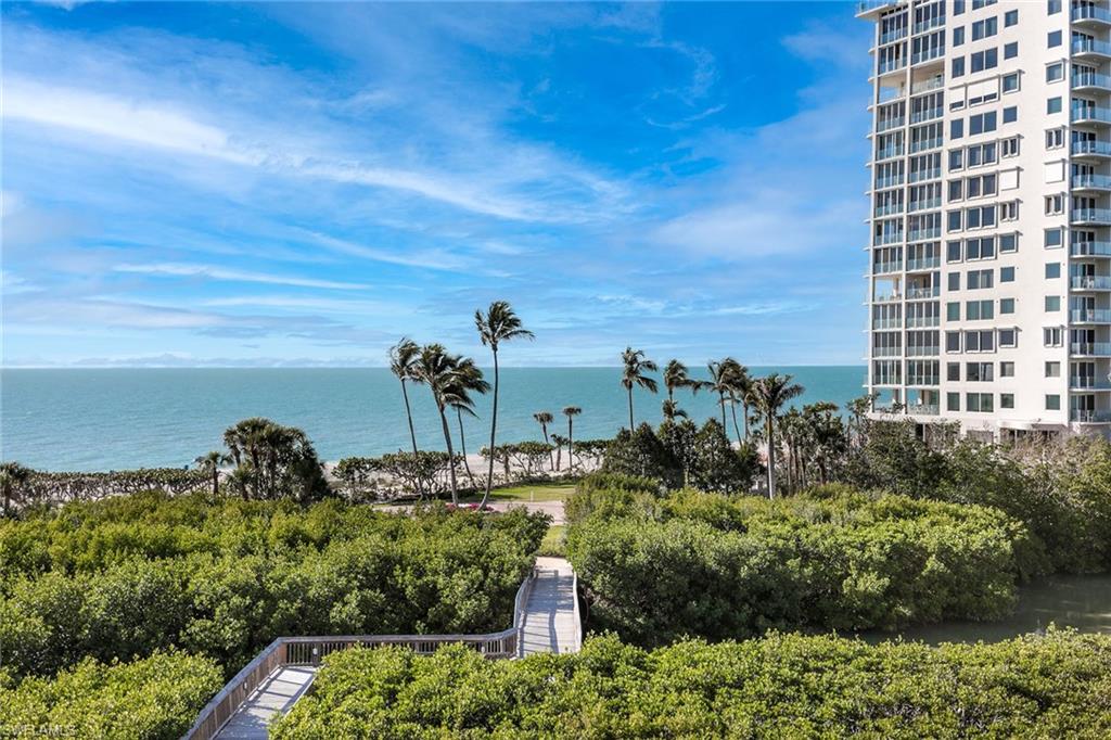 50 Seagate Drive, Unit 402B Naples, FL 34103 - Photo 19 of 26 a view of a garden