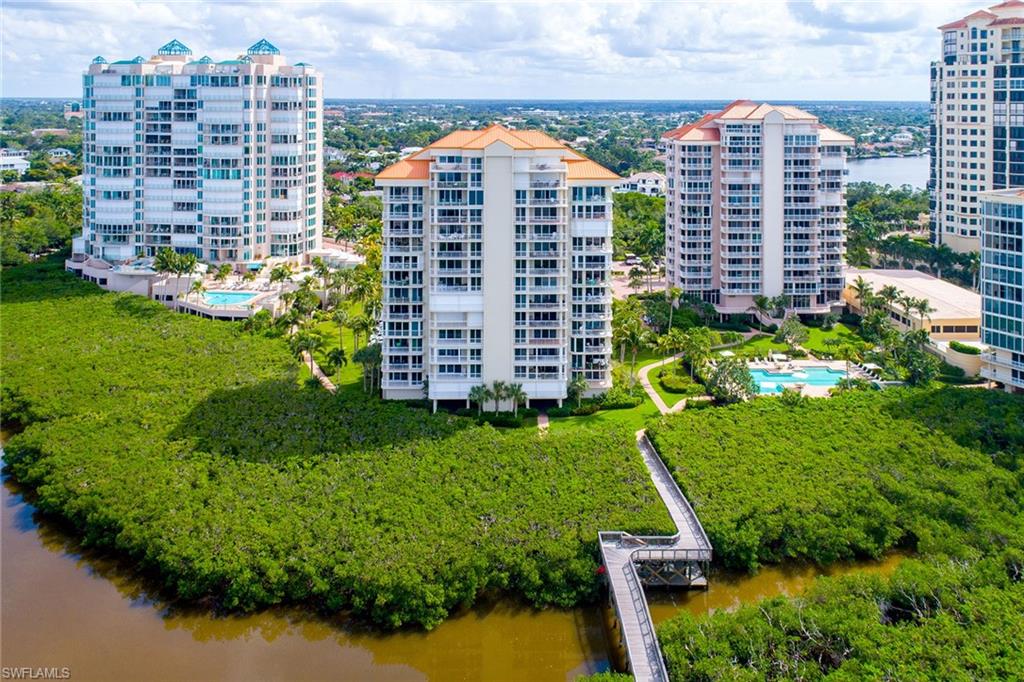 50 Seagate Drive, Unit 402B Naples, FL 34103 - Photo 26 of 26 a view of a city with tall buildings