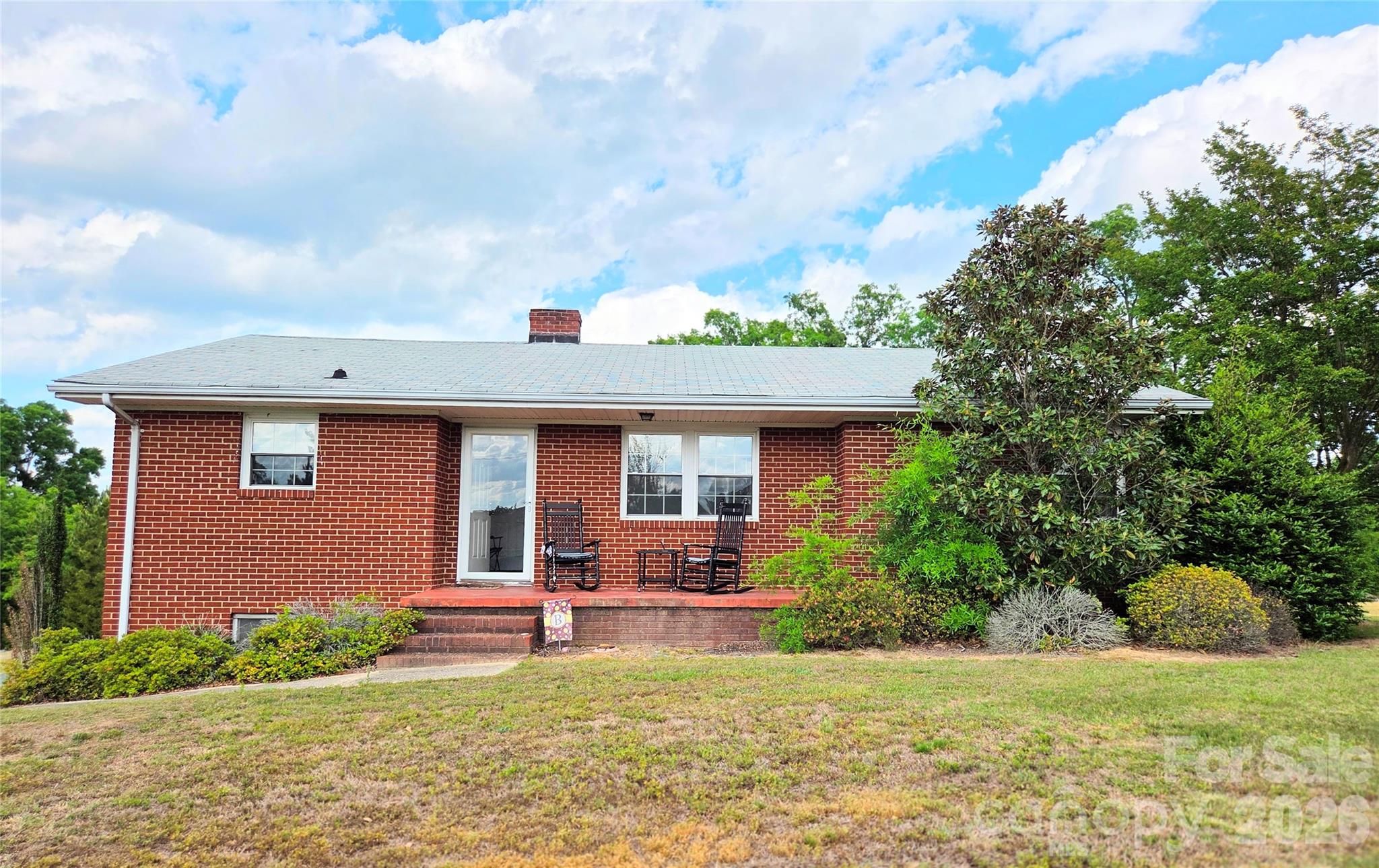 613 Judy Street Albemarle, NC 28001 - Photo 1 of 15 a front view of a house with garden