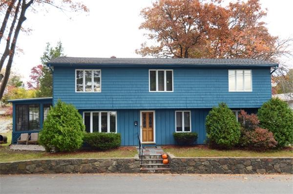 32 Pickman Road Salem, MA 01970 - Photo 1 of 26 a front view of a house with a yard and a garage