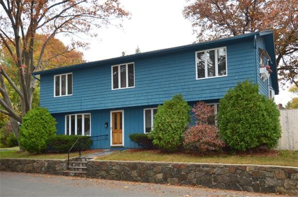 32 Pickman Road Salem, MA 01970 - Photo 2 of 26 a front view of a house with a garden and plants
