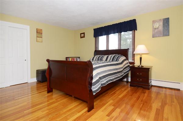 32 Pickman Road Salem, MA 01970 - Photo 21 of 26 a bed sitting in a bedroom next to a window