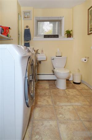 32 Pickman Road Salem, MA 01970 - Photo 24 of 26 a bathroom with a toilet sink and mirror