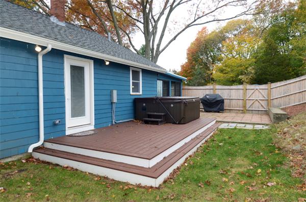 32 Pickman Road Salem, MA 01970 - Photo 4 of 26 a backyard of a house with table and sofas