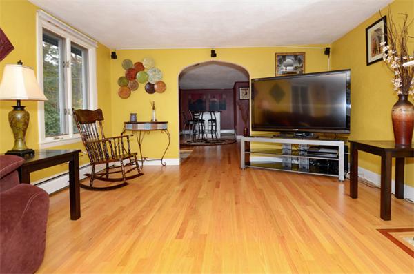 32 Pickman Road Salem, MA 01970 - Photo 8 of 26 a living room with furniture and a flat screen tv