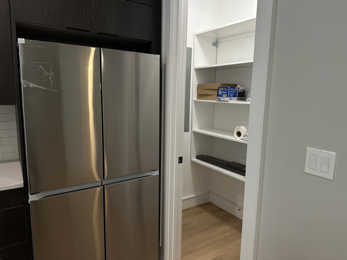 4243 North Damen Avenue, Unit 1F Chicago, IL 60618 - Photo 12 of 42 a view of walk in closet with empty racks