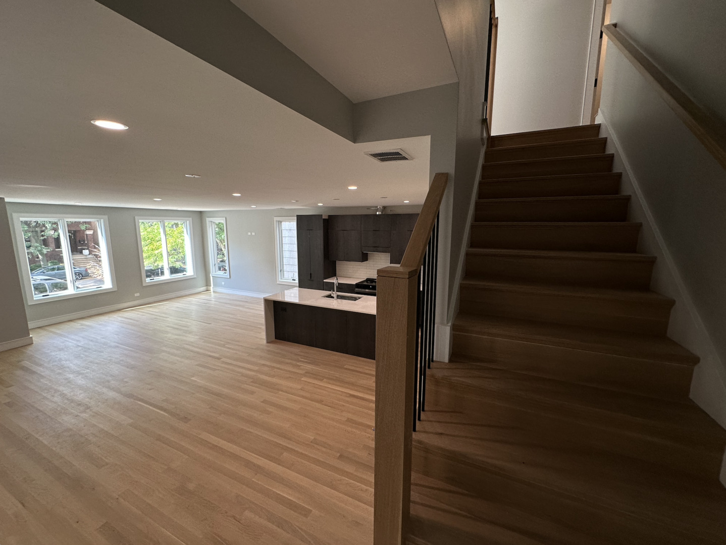 4243 North Damen Avenue, Unit 1F Chicago, IL 60618 - Photo 13 of 42 a view of kitchen and hall with wooden floor