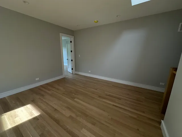 a view of an empty room and window