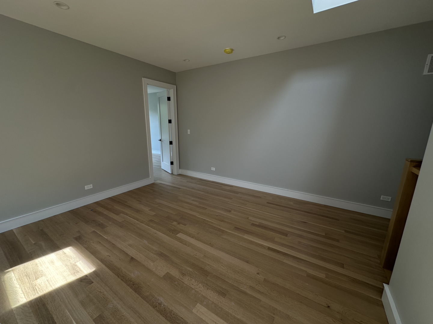 4243 North Damen Avenue, Unit 1F Chicago, IL 60618 - Photo 15 of 42 a view of an empty room and window