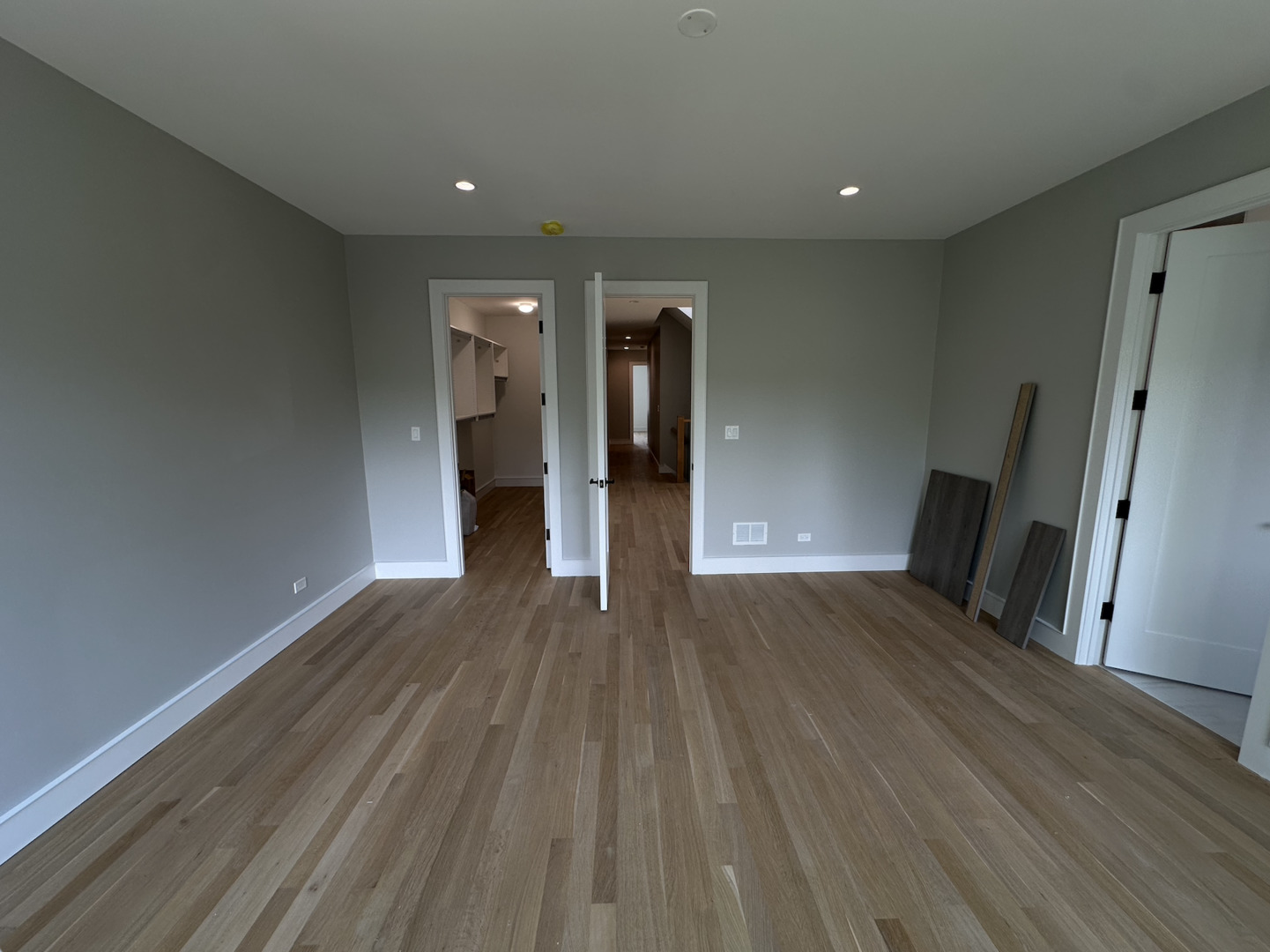 4243 North Damen Avenue, Unit 1F Chicago, IL 60618 - Photo 17 of 42 a view of a room with wooden floor and staircase