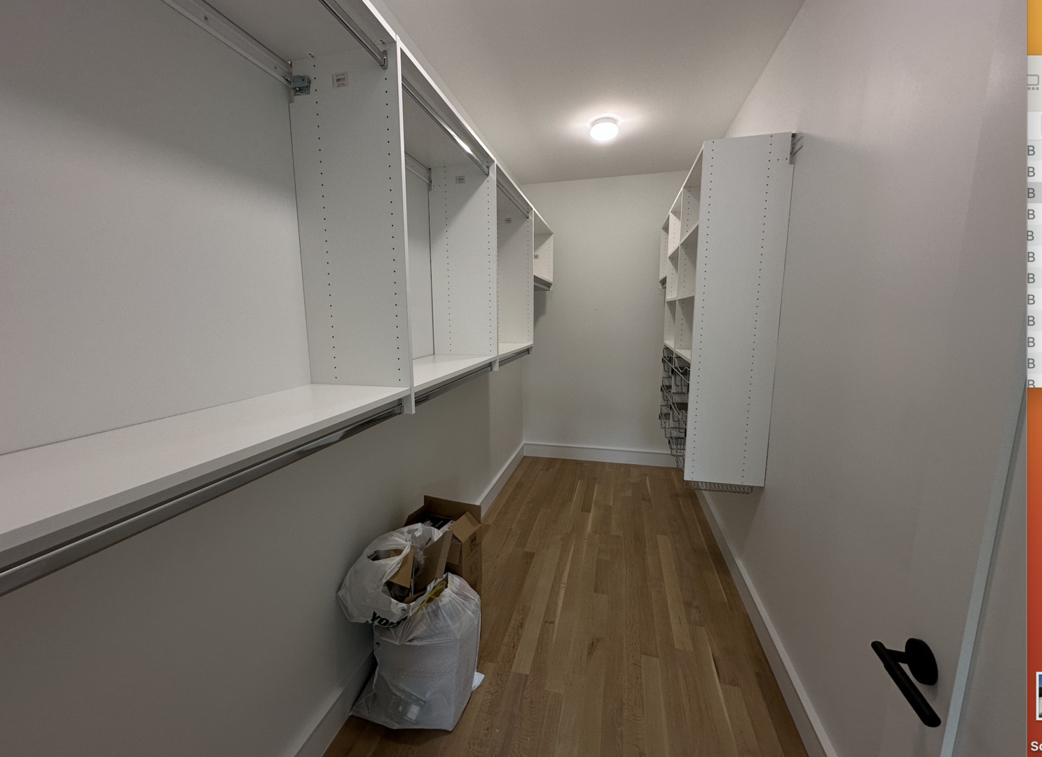 4243 North Damen Avenue, Unit 1F Chicago, IL 60618 - Photo 18 of 42 a view of a closet with wooden floor