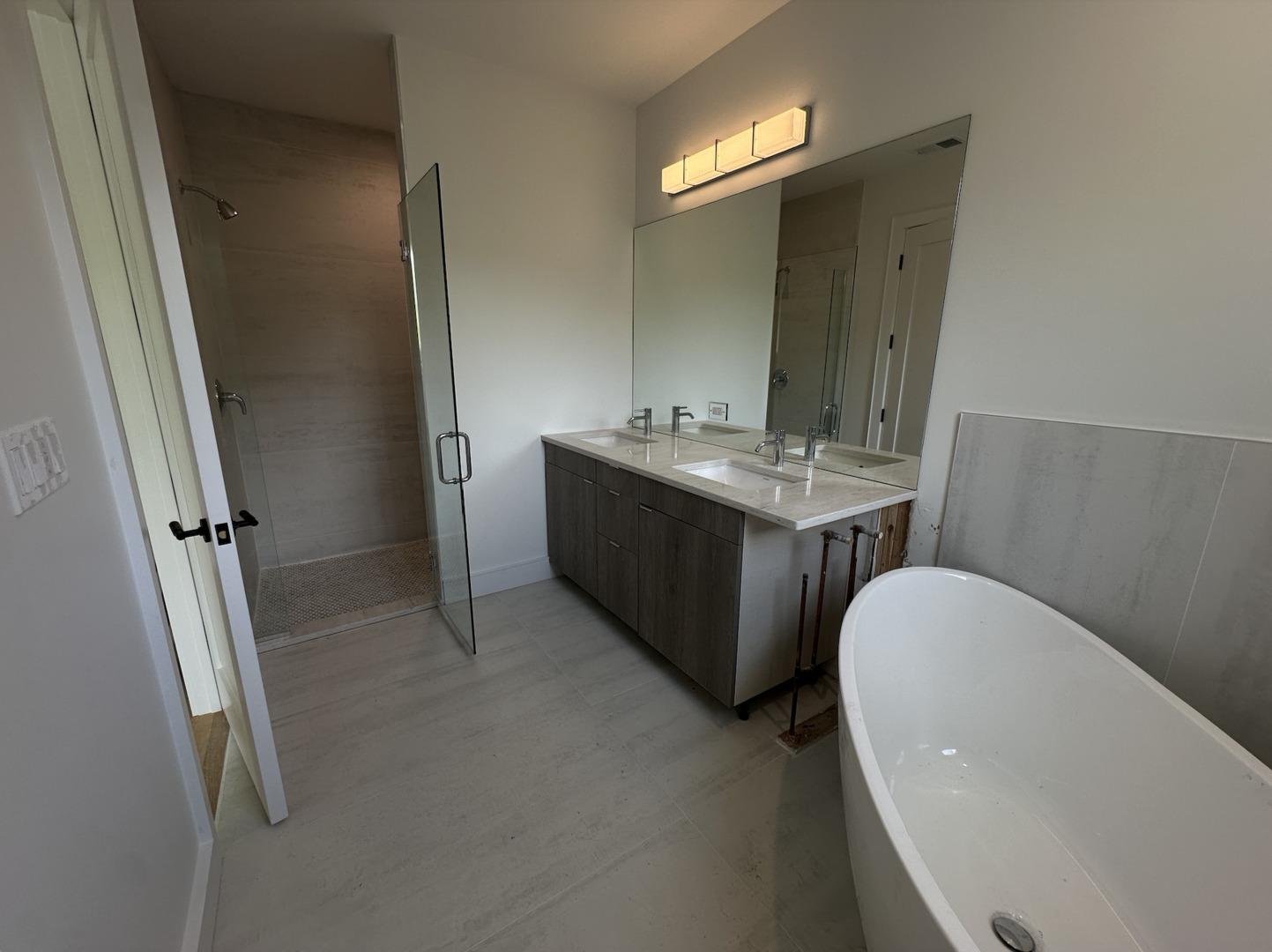 4243 North Damen Avenue, Unit 1F Chicago, IL 60618 - Photo 21 of 42 a bathroom with a granite countertop sink toilet and mirror