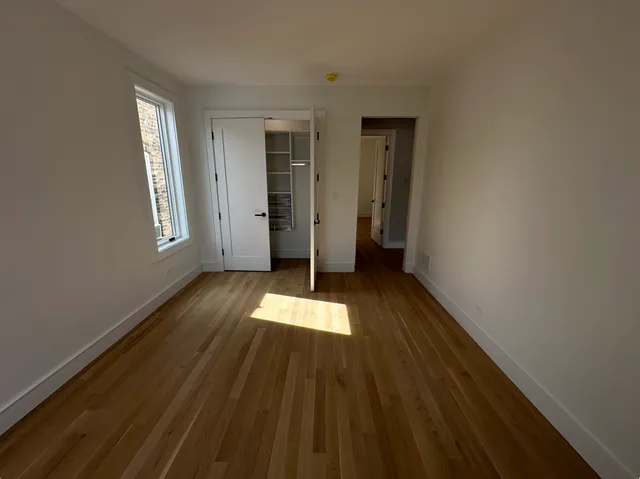a view of gallery with wooden floor