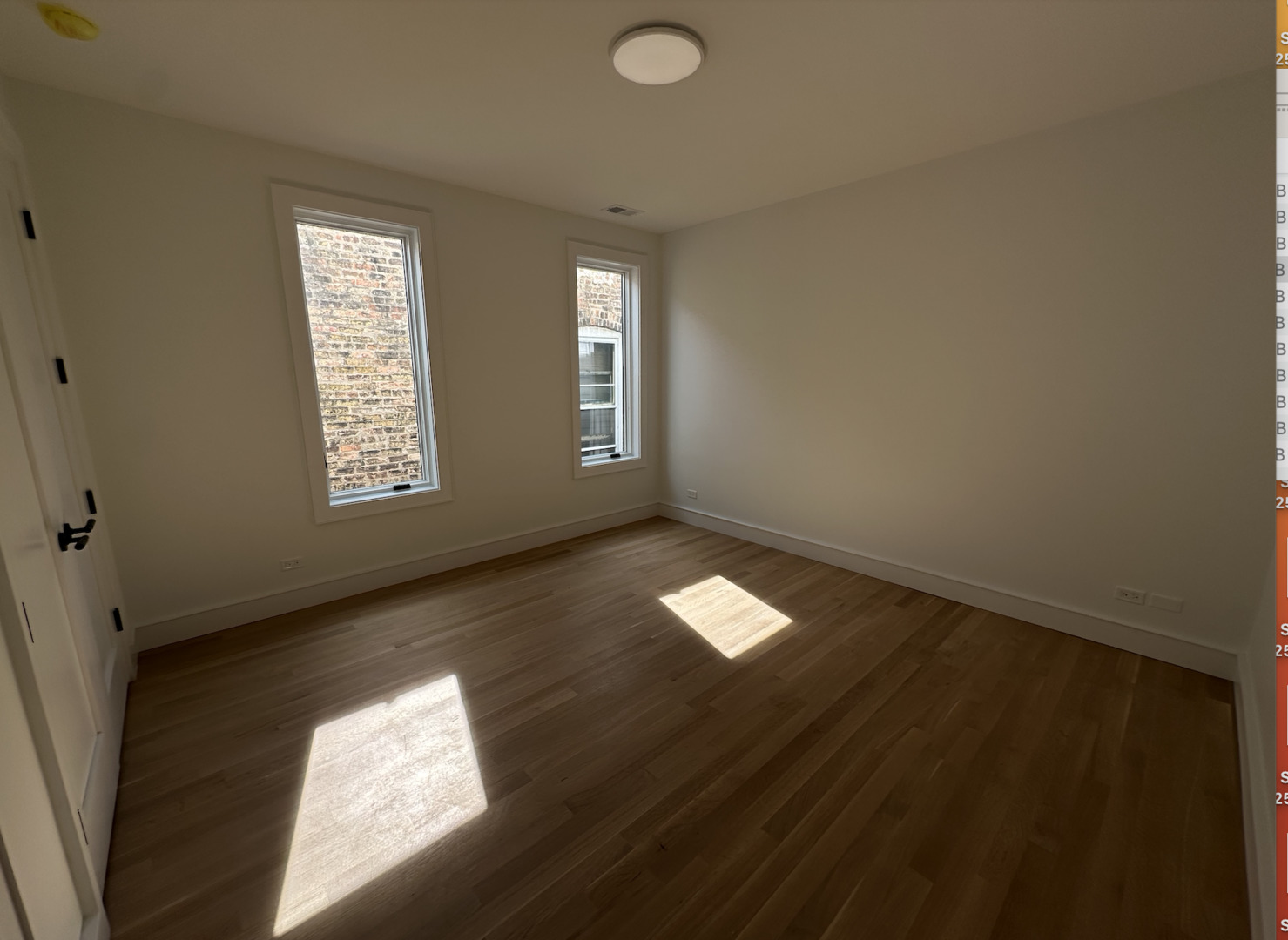 4243 North Damen Avenue, Unit 1F Chicago, IL 60618 - Photo 34 of 42 a view of empty room with windows