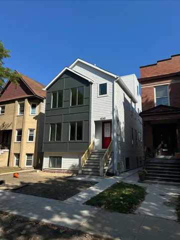 a front view of a house with street