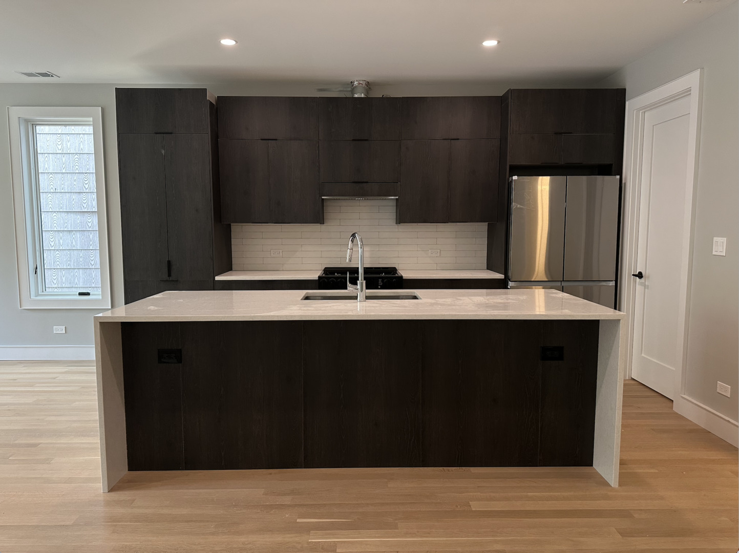 4243 North Damen Avenue, Unit 1F Chicago, IL 60618 - Photo 7 of 42 a close view of kitchen with granite countertop