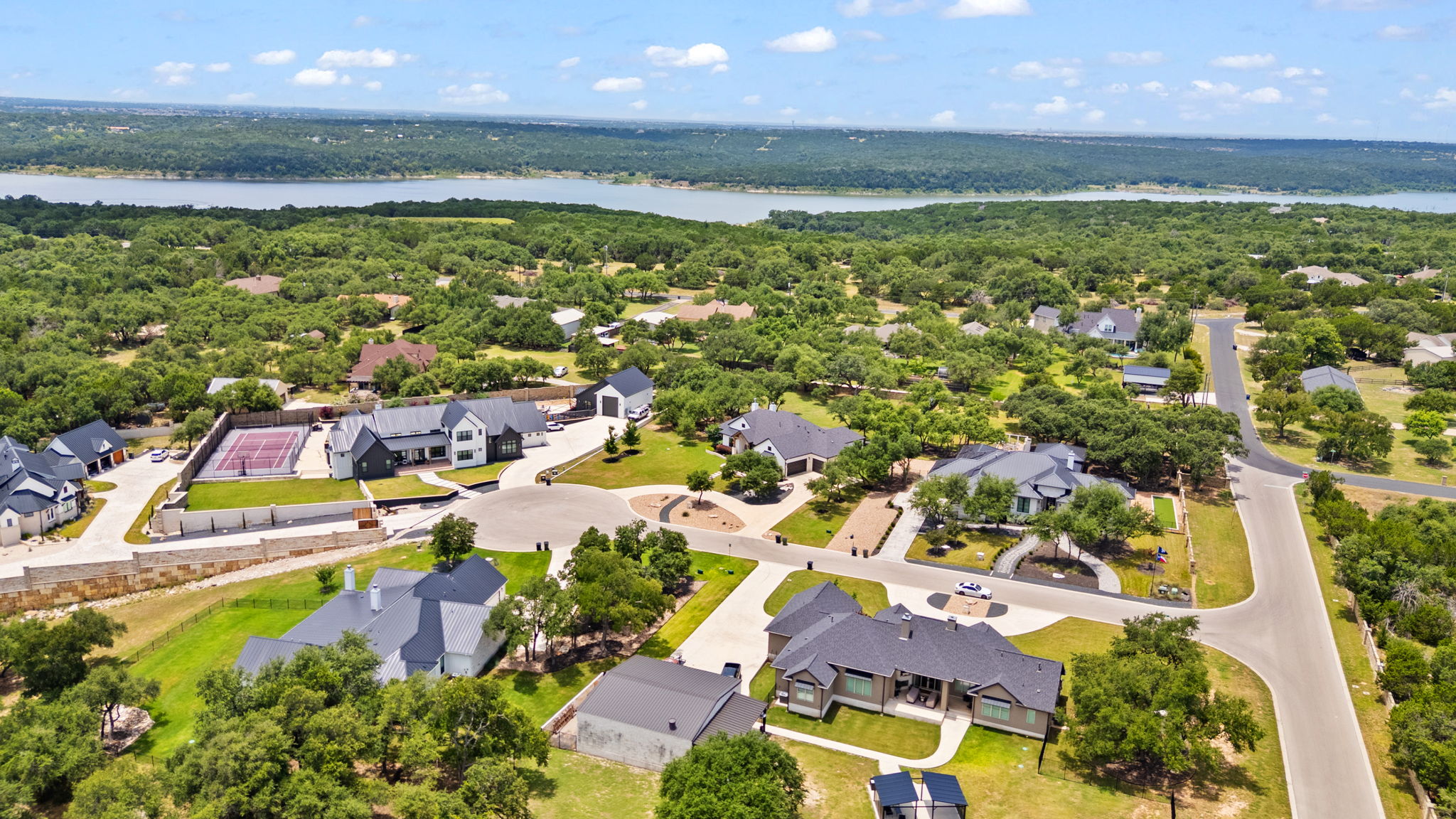 104 Lower Cedar Cove Georgetown, TX 78633 - Photo 28 of 37 an aerial view of residential houses with outdoor space and swimming pool
