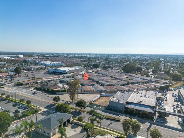 an aerial view of a fireplace with table and chairs
