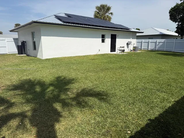 a view of a backyard with plants