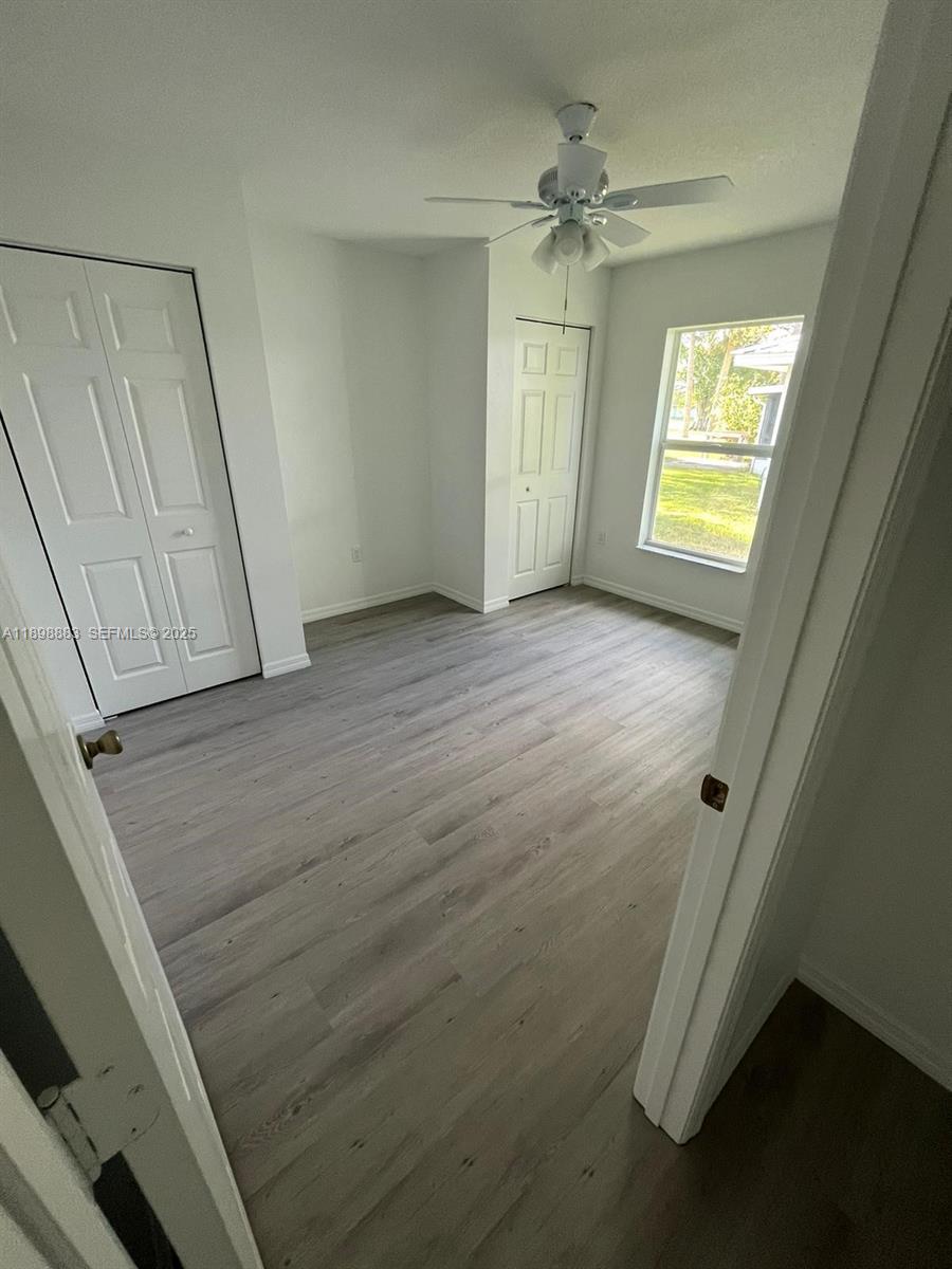 5218 Southeast 43rd Street Okeechobee, FL 34974 - Photo 4 of 20 a view of an empty room with a window