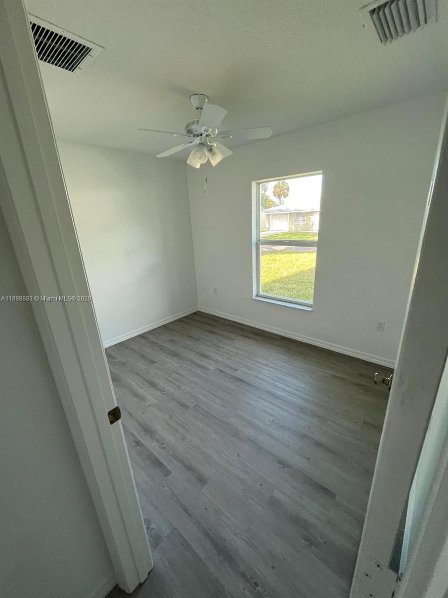 5218 Southeast 43rd Street Okeechobee, FL 34974 - Photo 9 of 20 a view of empty room with window
