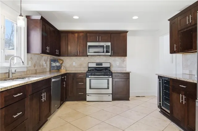 $445,000 | 23 East 69th Street, Kansas City, MO 64113