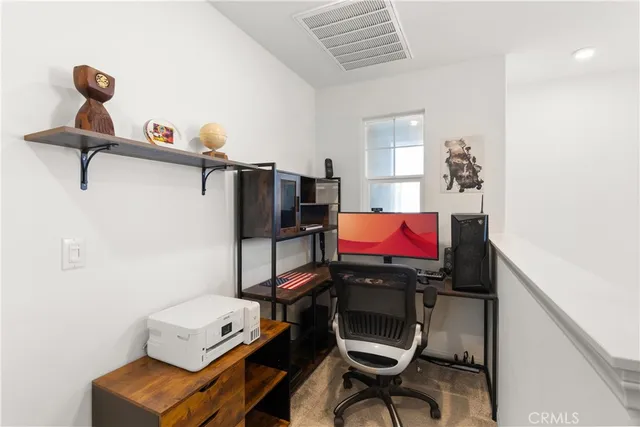 a room with furniture and a window