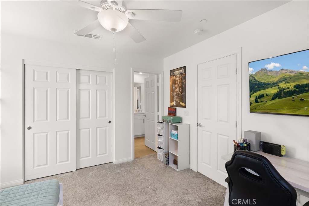 904 Maya Crossing, Unit 19 Lake Elsinore, CA 92530 - Photo 18 of 25 a view of a livingroom with a workspace