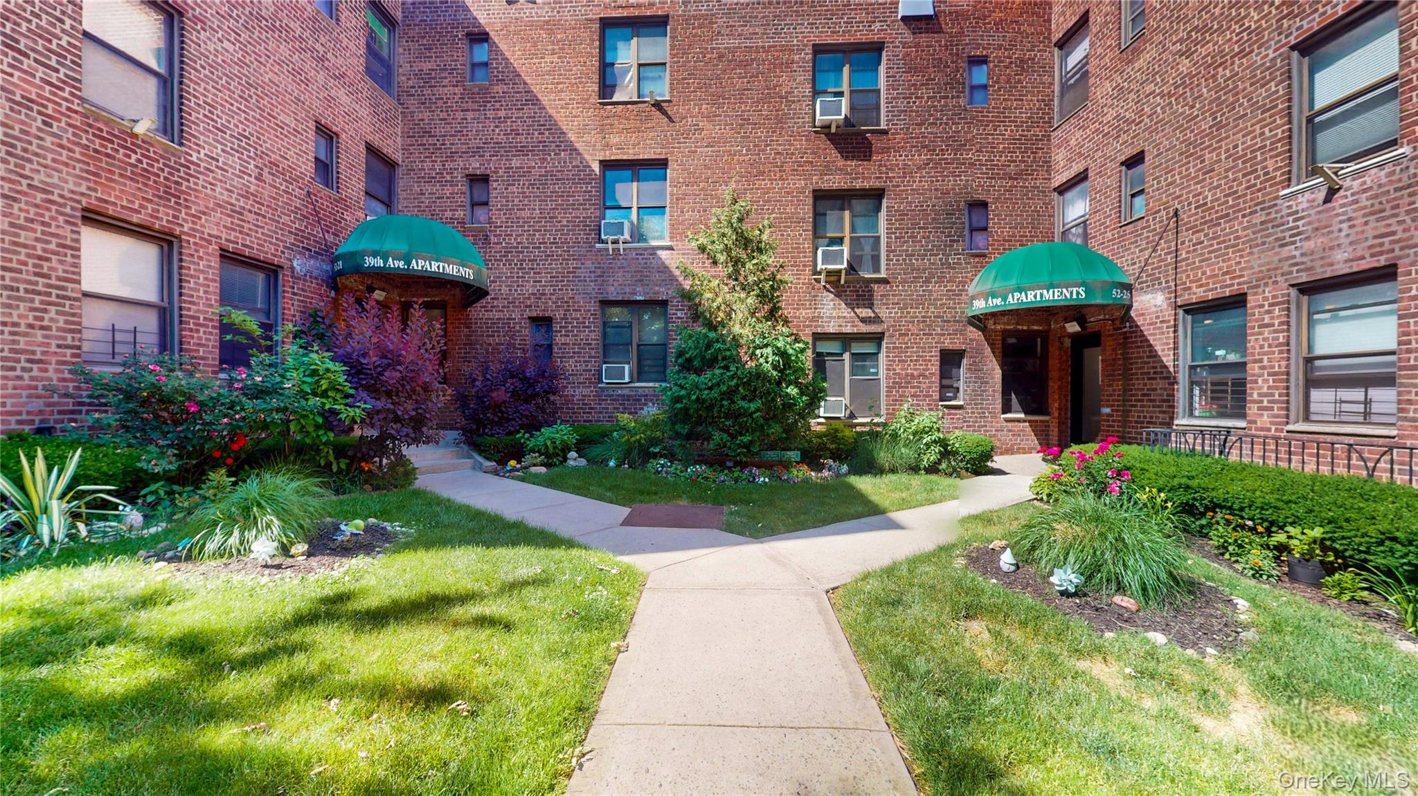 52-21 39th Road, Unit 2A Queens, NY 11377 - Photo 1 of 21 Front exterior of building