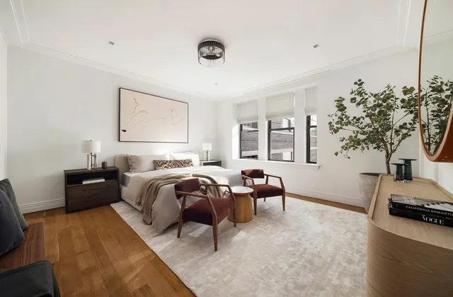 a kitchen with stainless steel appliances a sink stove and cabinets