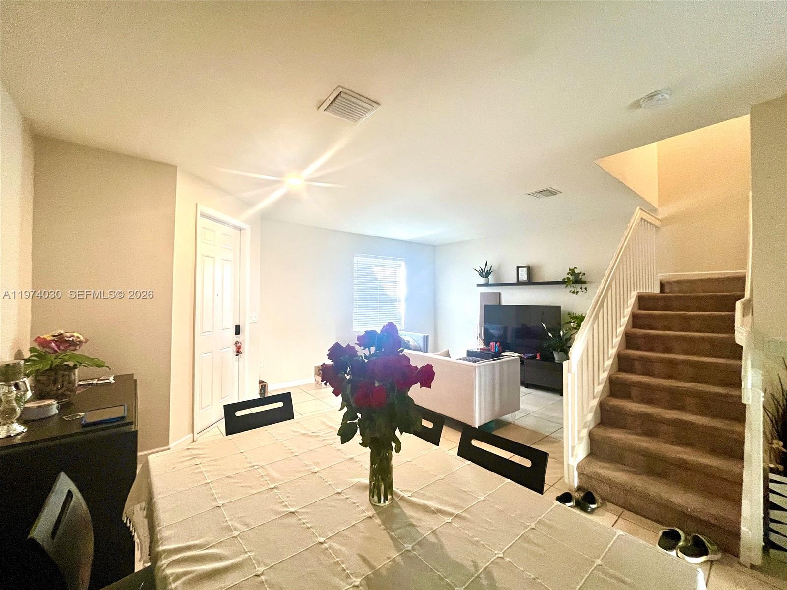 9271 West 33rd Lane Hialeah, FL 33018 - Photo 7 of 26 a living room with furniture and wooden floor