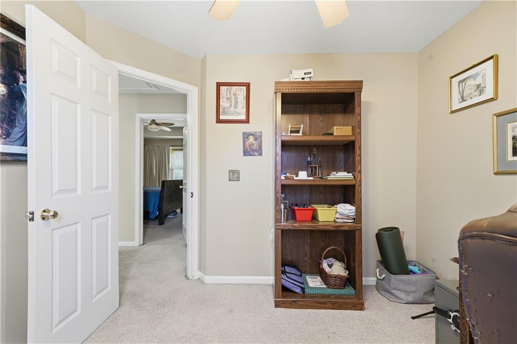 137 Orchard Way Southeast Calhoun, GA 30701 - Photo 14 of 39 a bedroom with a workspace and a window