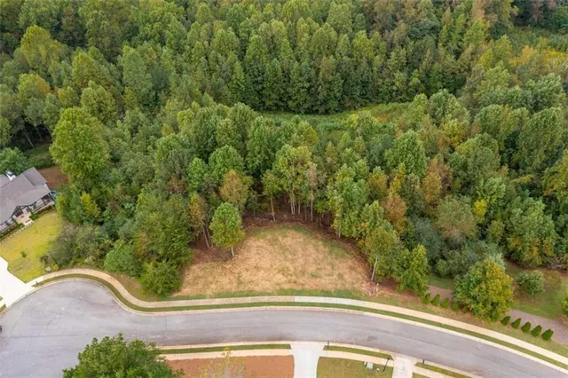 a view of a yard from a balcony