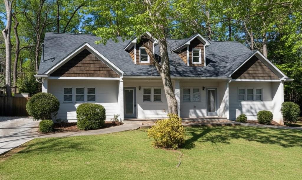 342 Mathews Avenue Northeast, Unit A Atlanta, GA 30307 - Photo 1 of 34 a front view of a house with a yard and porch