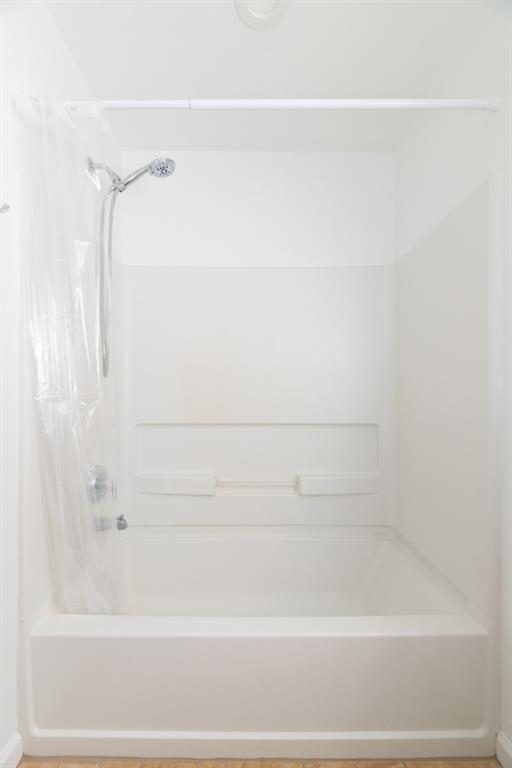 342 Mathews Avenue Northeast, Unit A Atlanta, GA 30307 - Photo 16 of 34 a bathroom with a bathtub