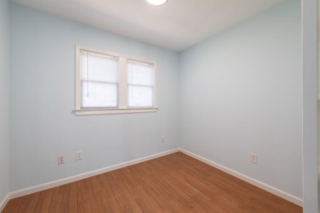 342 Mathews Avenue Northeast, Unit A Atlanta, GA 30307 - Photo 25 of 34 an empty room with a window