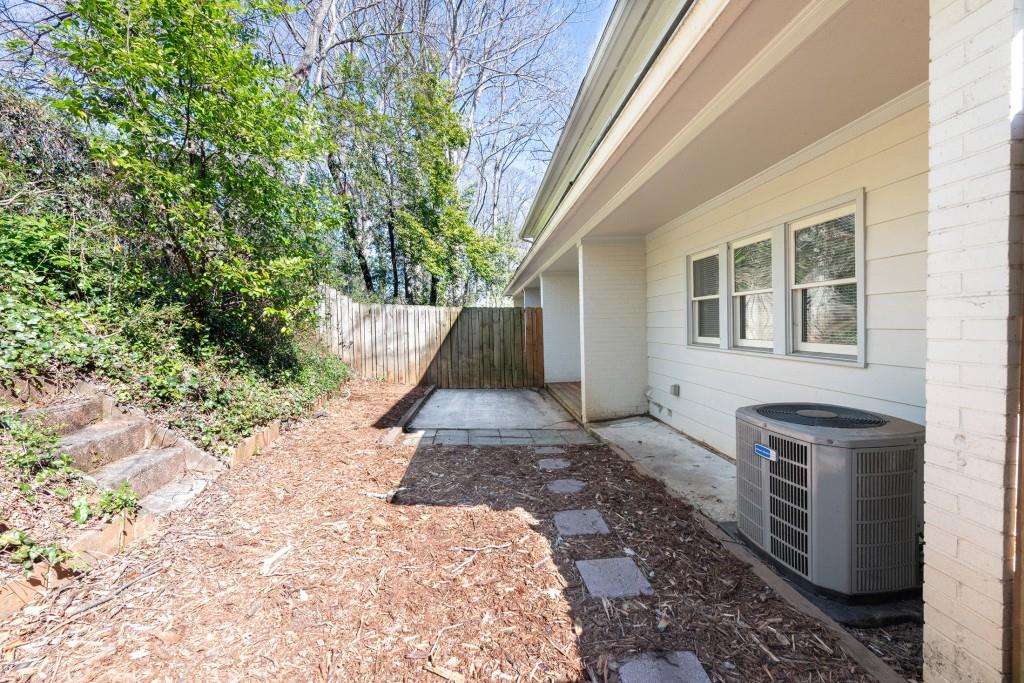342 Mathews Avenue Northeast, Unit A Atlanta, GA 30307 - Photo 27 of 34 a front view of a house with a yard