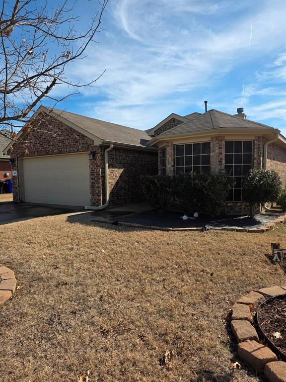 213 Independence Trail Forney, TX 75126 - Photo 1 of 17 a front view of a house with a yard