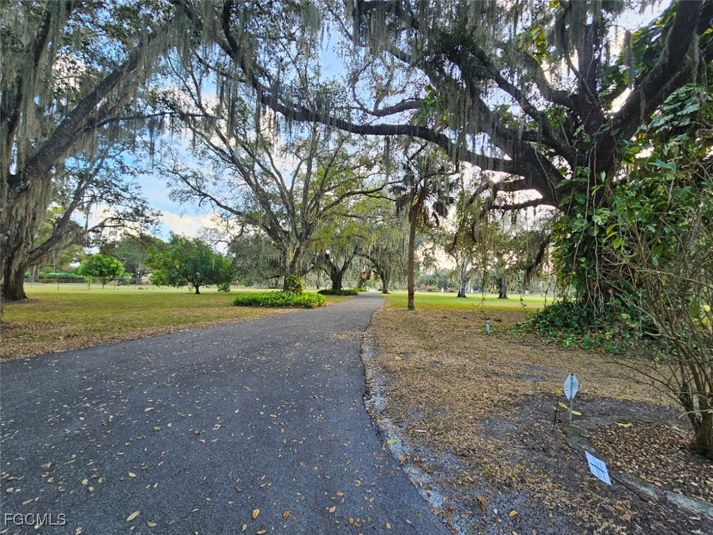 3680 Fort Denaud Road LaBelle, FL 33935 - Photo 4 of 49 a view of outdoor space with playground and green space