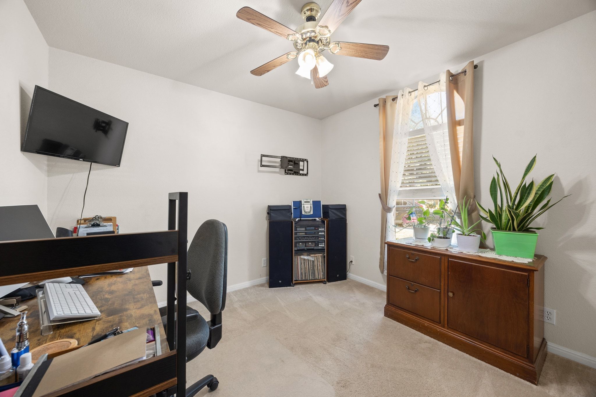 901 Kenneys Way Round Rock, TX 78665 - Photo 25 of 33 Home office featuring light colored carpet and ceiling fan