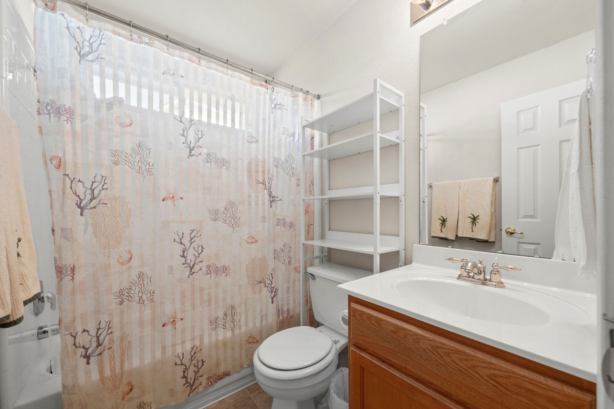901 Kenneys Way Round Rock, TX 78665 - Photo 26 of 33 Bathroom with vanity and tile patterned floors