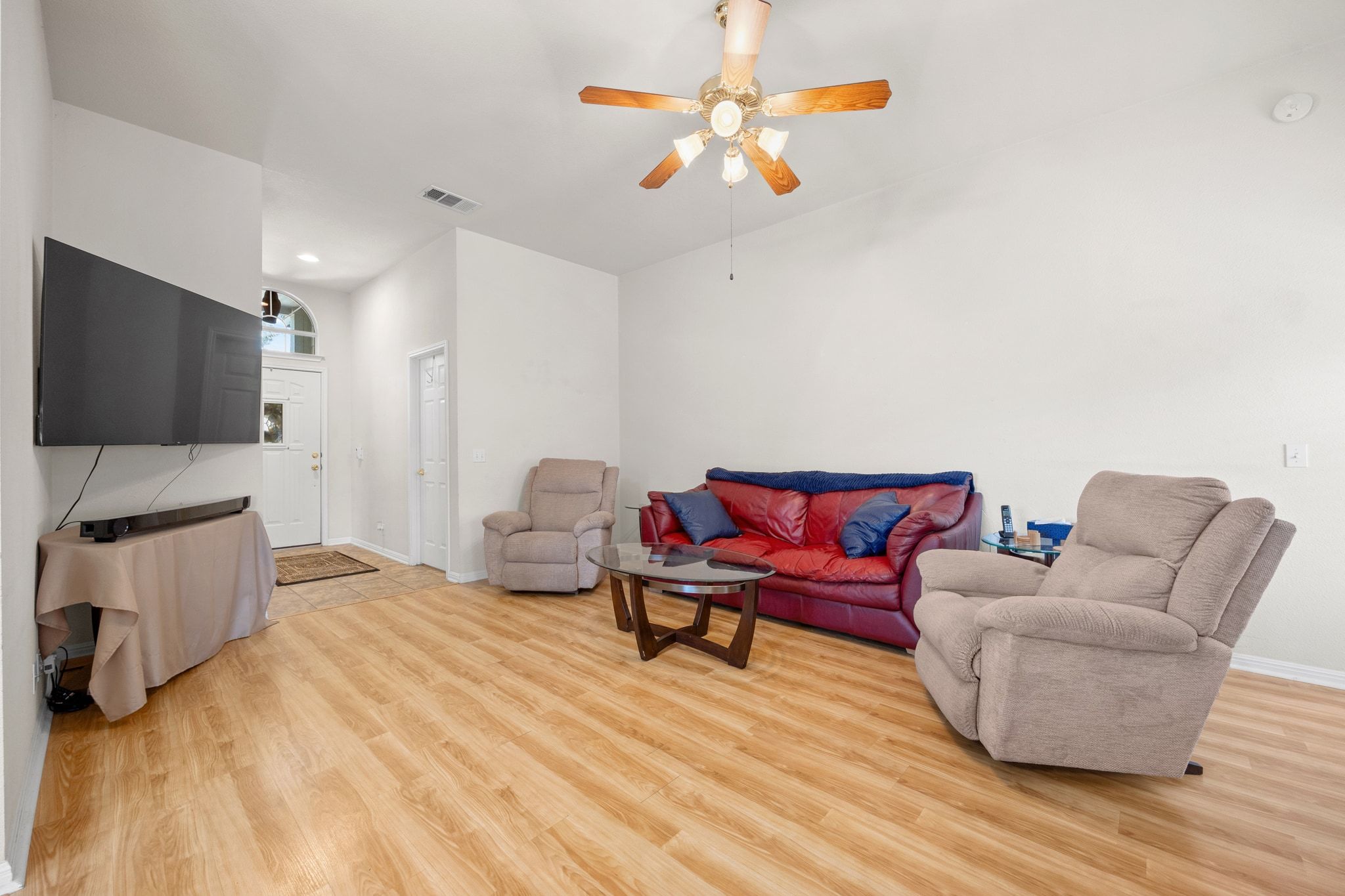 901 Kenneys Way Round Rock, TX 78665 - Photo 8 of 33 Living area with light wood-style floors and a ceiling fan