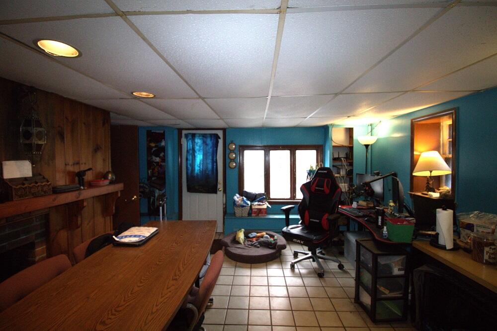 930 Old Bass River Road Dennis, MA 02638 - Photo 28 of 34 a room with lots of furniture and potted plants