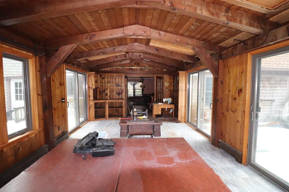 930 Old Bass River Road Dennis, MA 02638 - Photo 10 of 34 a room with lots of furniture and a chandelier