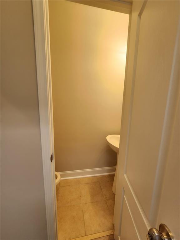 5520 Casey Valley Way Cumming, GA 30040 - Photo 11 of 25 a bathroom with a sink